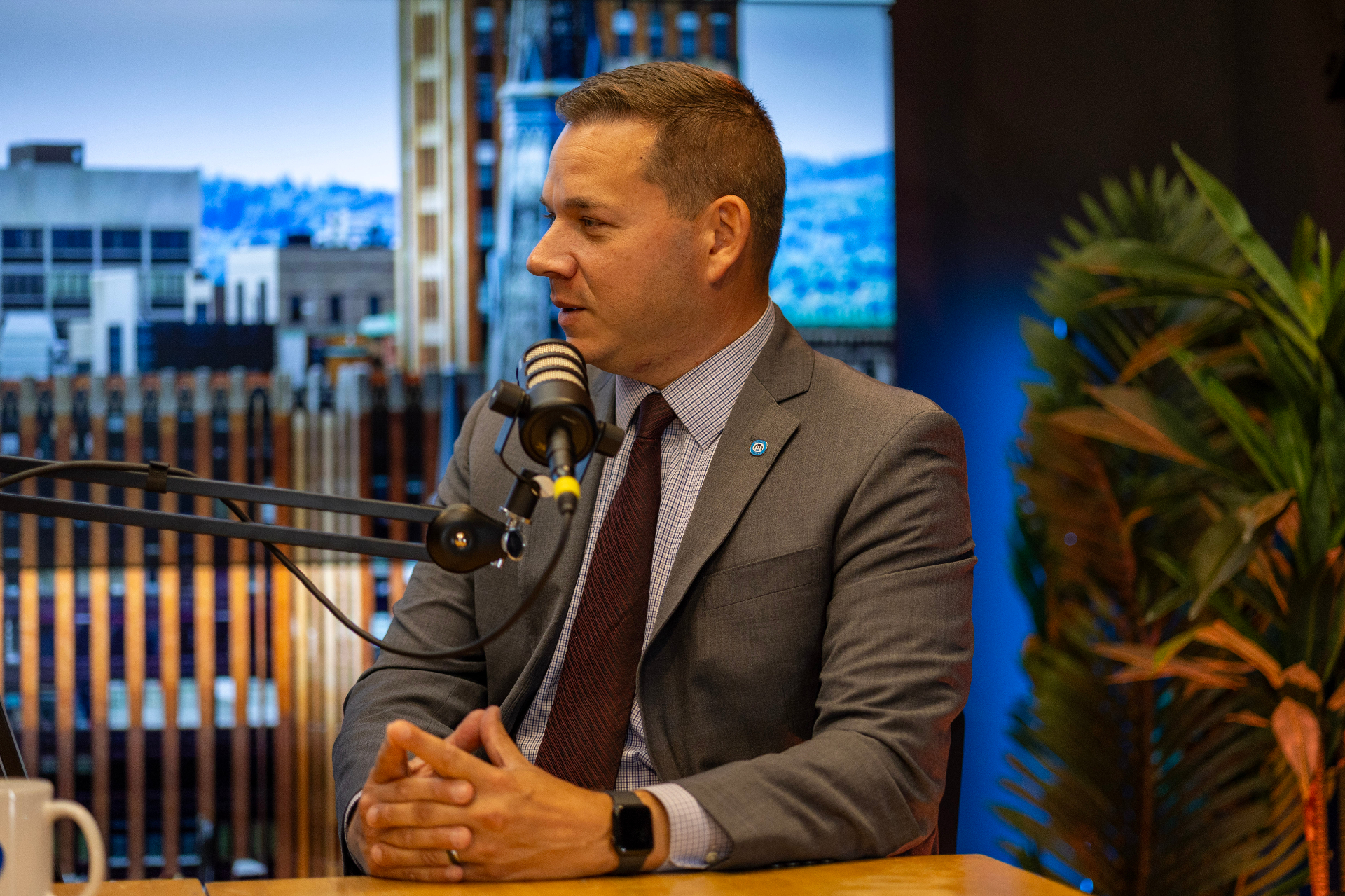 Executive interview guest recorded on a professional podcast set
